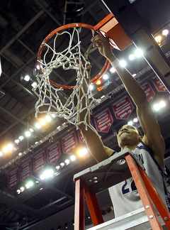 Otto Porter cuts down a piece of the net.