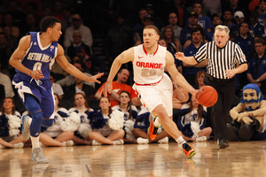 Syracuse guard Brandon Triche pushes the ball up court. The senior finished with 17 points on 6-of-9 shooting.