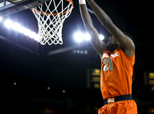 Syracuse forward Tyler Roberson elevates toward the rim during his return to action Tuesday night. The sophomore played in a game for the first time since Nov. 21.