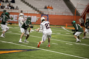 Nick Mariano unwinds on the Binghamton net on Wednesday night. He scored a team-high four goals in the Orange's 13-5 win.