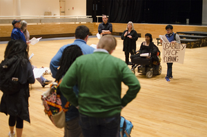 Priya Penner and Elly Wong led the reading of the names at the Disability Day of Mourning vigil at SU on Wednesday.