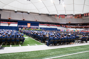 John Palmer is Syracuse University’s new mace bearer, a position of honor that began in 1949. 
