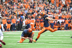 Szmyt, pictured kicking a PAT against Louisville, made 28 field goals this season.