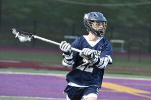 Skaneateles High School lacrosse attack Landen Brunelle developed his game through training with a long pole teammate.