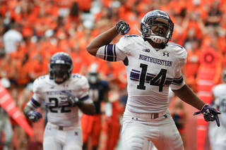 Wide receiver Christian Jones reacts after scoring a touchdown in the first half.