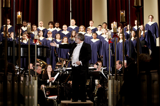 The Syracuse Brass Ensemble and the Hendricks Chapel Choir perform Christmas songs at the holiday concert. 