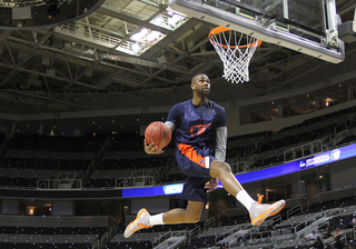 James Southerland dunks the ball during practice.