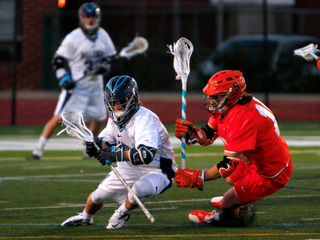 Matt Pratt defends in Syracuse's 11-100 loss to Villanova.