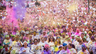 Oct. 5, 2013: Thousands of people ran in the Run or Dye 5k on Saturday morning. During the event, volunteers threw powder dye at runners as they passed through designated checkpoints. Afterward, runners threw their own dye into the sky. 