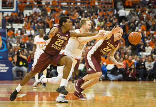 Cooney reaches for a fumbled ball, but is beat by Florida State's offense.