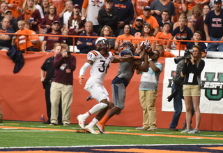 Outside receiver Steve Ishmael makes a sideline catch. He had to toe tap for the reception to count. He grabbed six passes for 81 yards. 